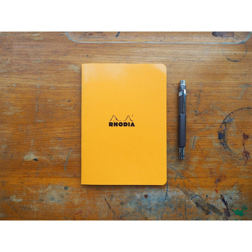<center>Rhodia Side-Stapled Notebook - Graph - Orange (A5)</center>
